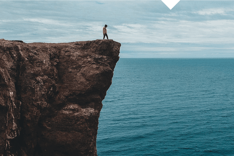 cliff sea man