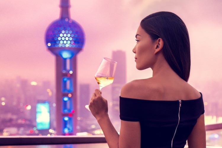 shanghai woman drinking wine